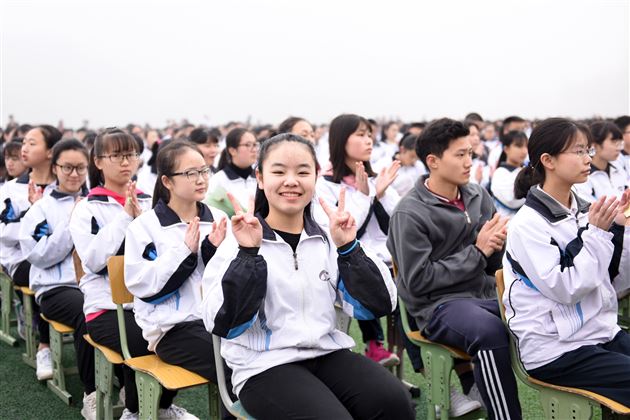 棠外初2014级中考百日冲刺誓师大会顺利举行