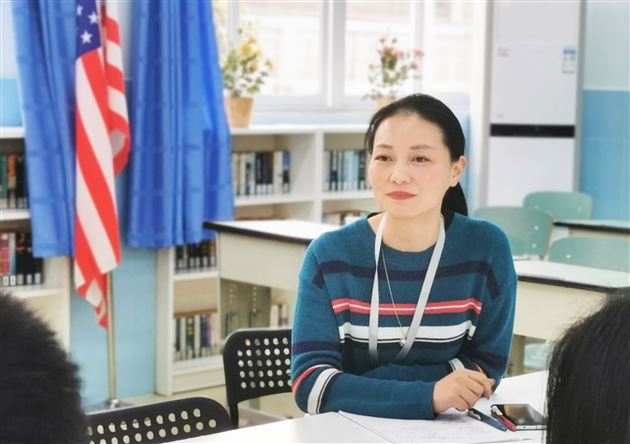 国际部主任——曾梁一