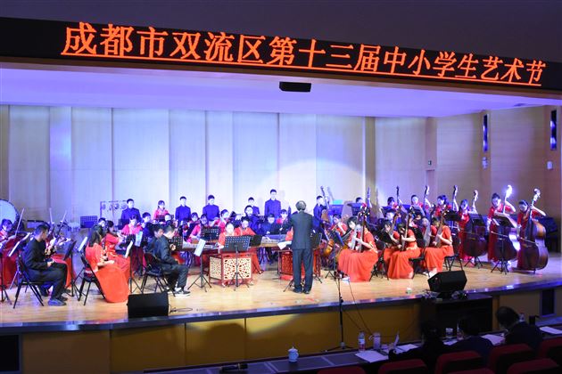 棠外飞鹰艺术团民乐团代表双流区参加成都市第十三届学生艺术节器乐合奏比赛荣获一等奖