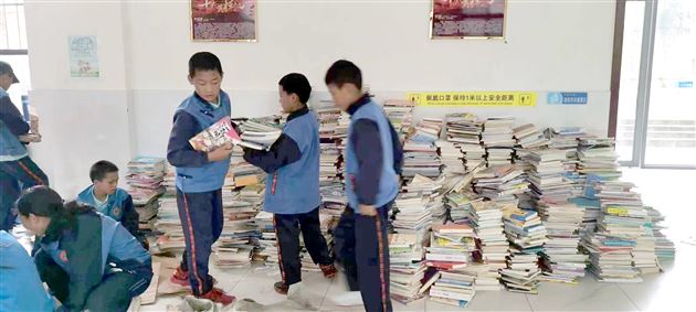 情系藏区少年共建爱心书馆